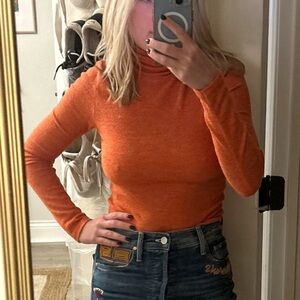 Orange Turtleneck Sweater